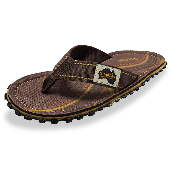 GUMBIES FRANCE Islander Aboriginal brown flip-flops with a woven strap and a patterned sole. Made from recycled rubber and cotton.
