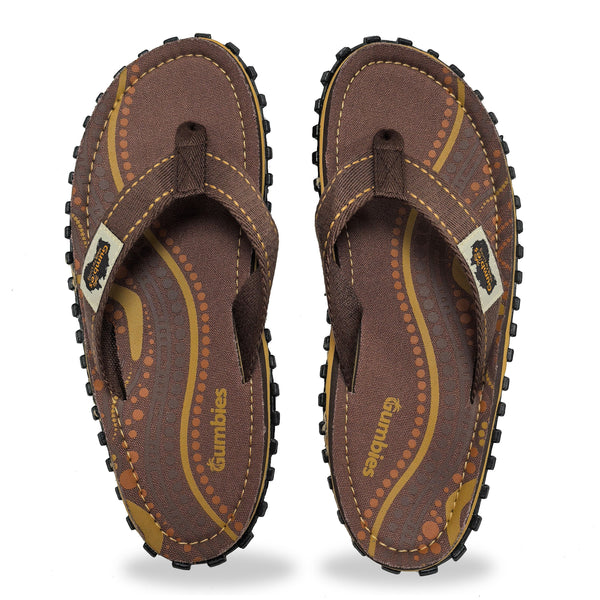 GUMBIES FRANCE Islander Aboriginal print flip-flops with brown canvas straps and recycled rubber sole.
