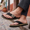 GUMBIES FRANCE Classic Black canvas flip-flops with tan stitching and a textured rubber sole.