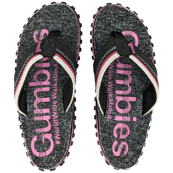 Gumbies France black and pink knit flip-flops with "#WorldWideWalkabout" text and white/pink striped straps.