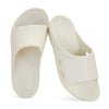 GUMBIES FRANCE cream eco-friendly slides with contoured footbed and Gumbies logo. Comfortable recovery footwear.