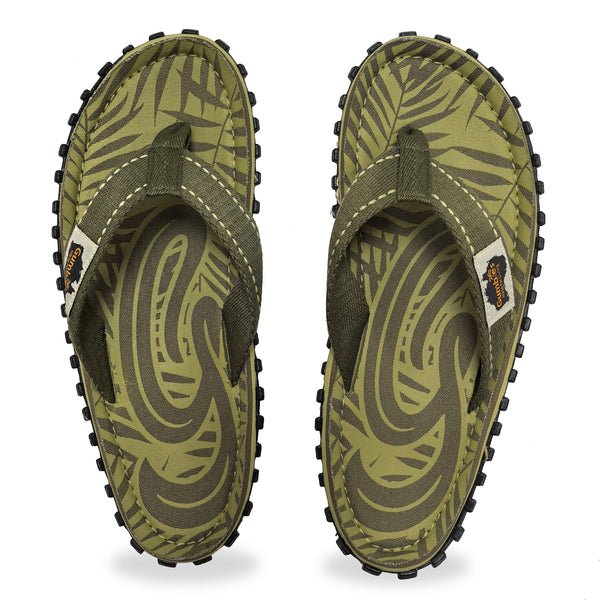 GUMBIES FRANCE men's khaki flip-flops with palm leaf pattern and textured sole.