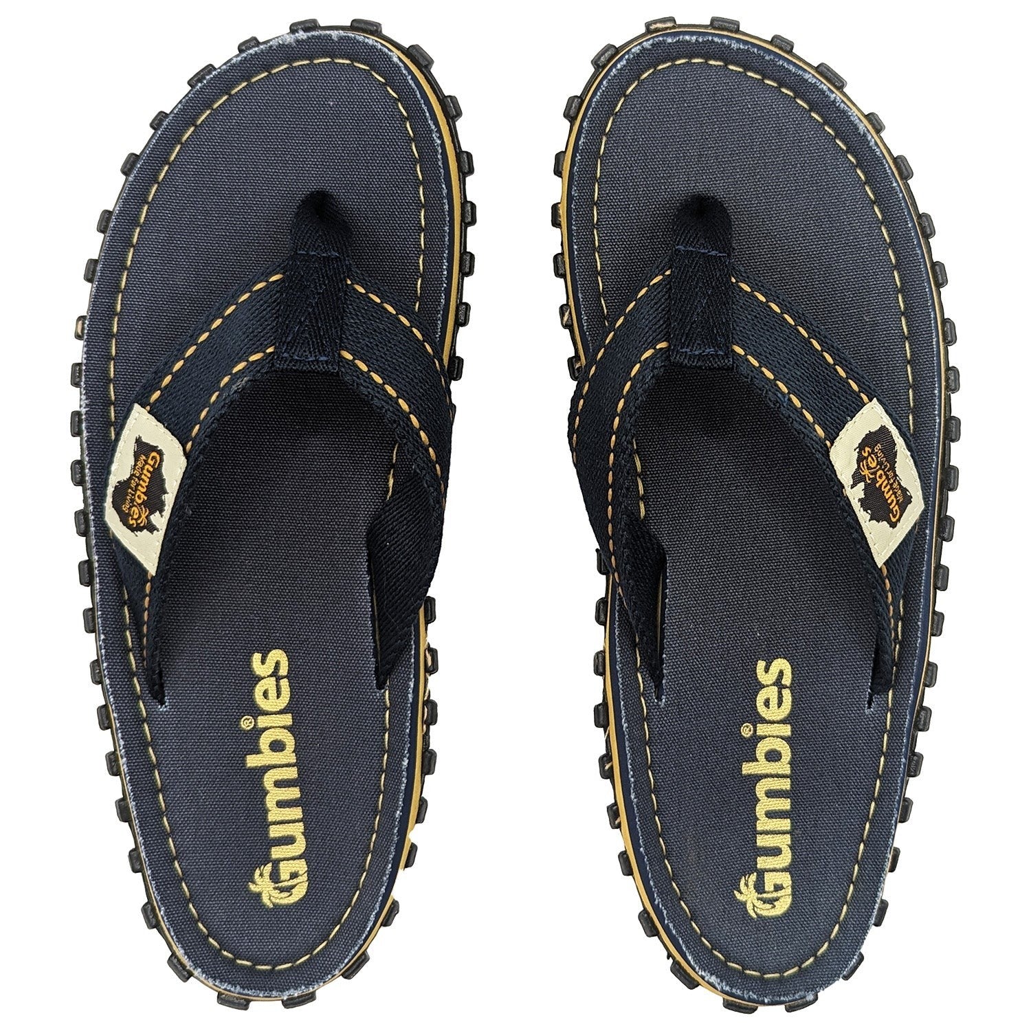 GUMBIES FRANCE navy blue unisex flip-flops with yellow stitching and jute sole detail.