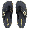 GUMBIES FRANCE navy blue unisex flip-flops with yellow stitching and jute sole detail.