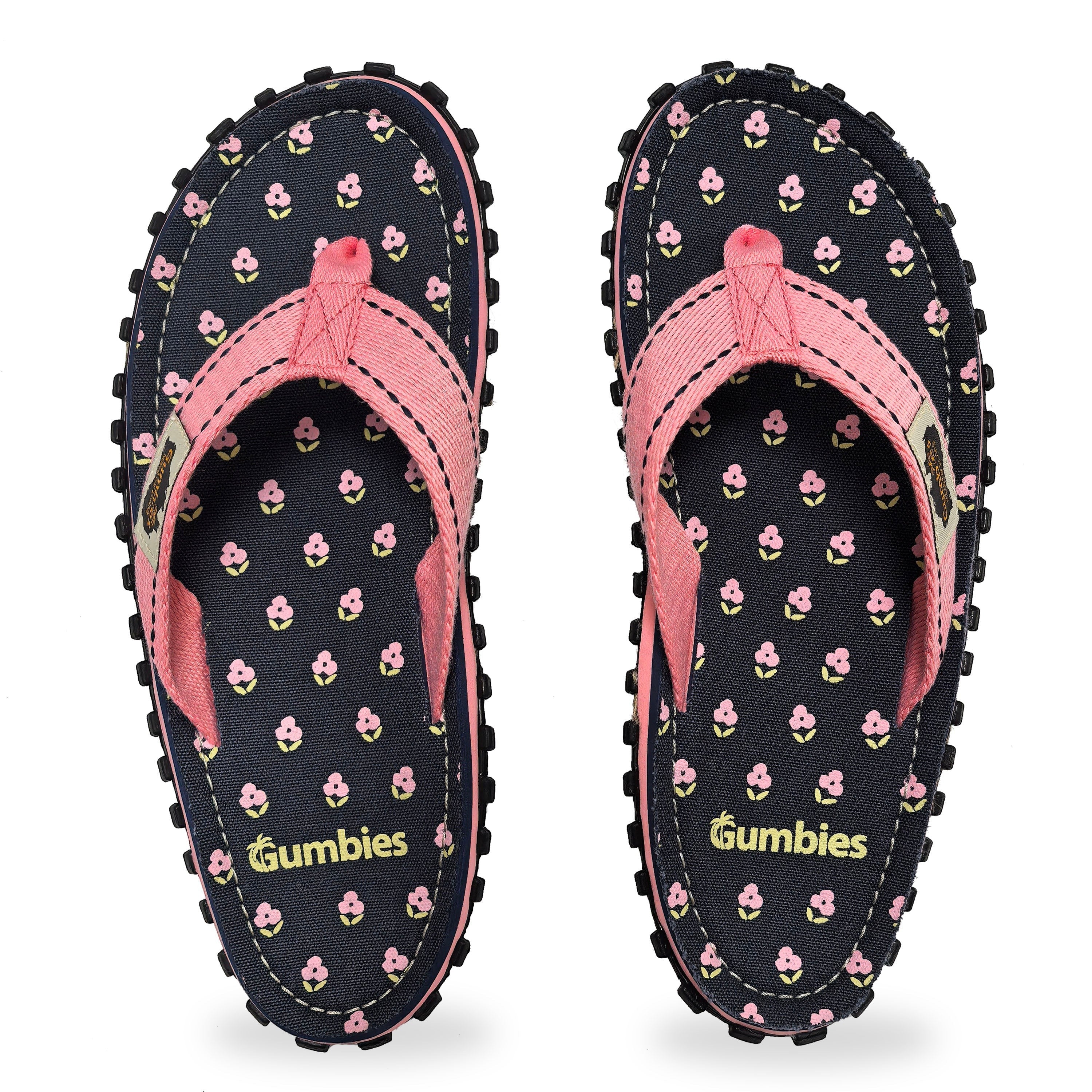 GUMBIES FRANCE navy blue flip-flops with pink floral print and pink straps. Eco-friendly, comfortable summer footwear.