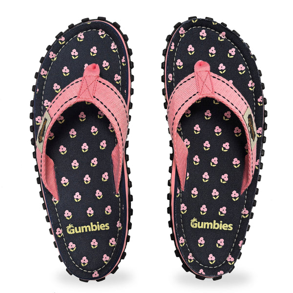 GUMBIES FRANCE navy blue flip-flops with pink floral print and pink straps. Eco-friendly, comfortable summer footwear.
