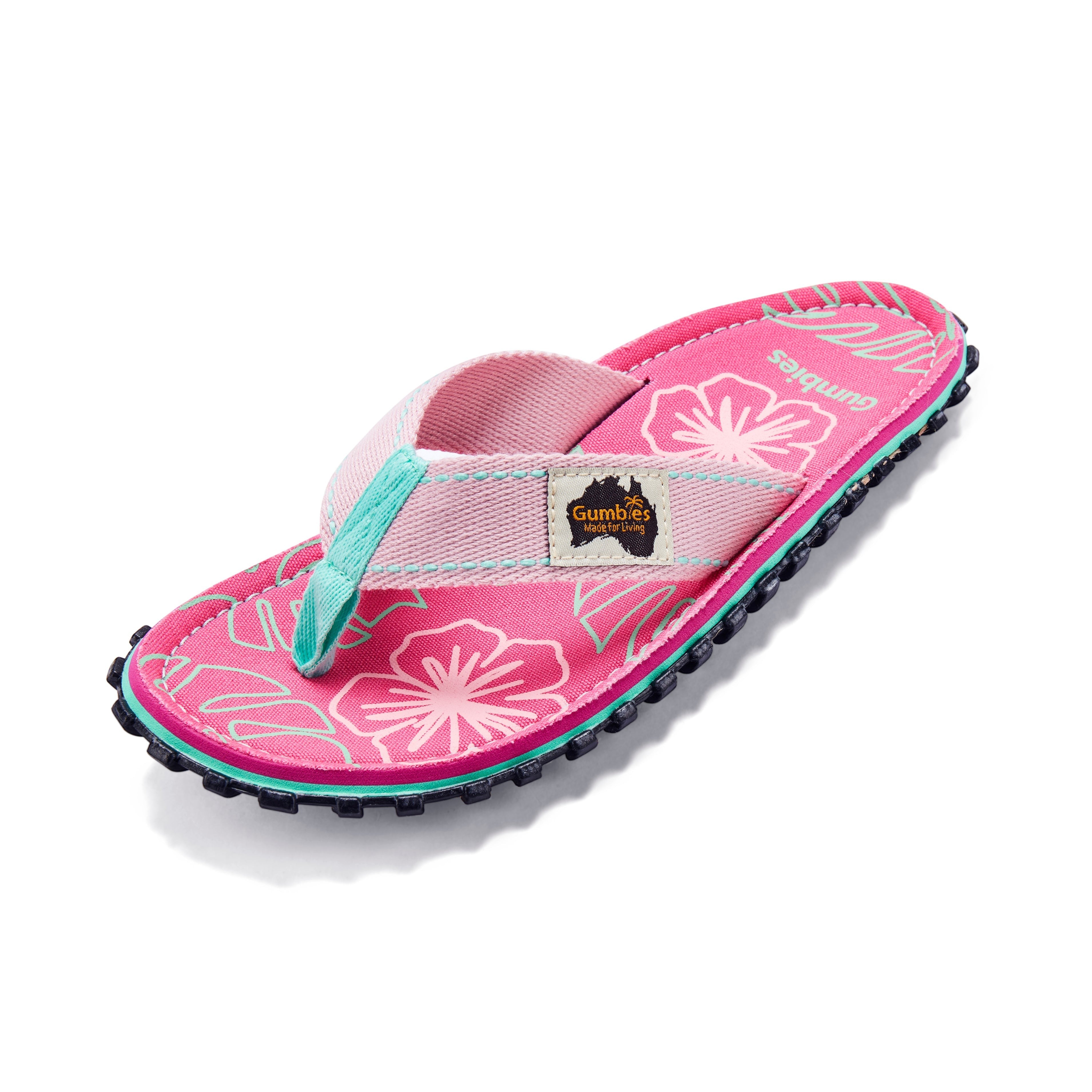 GUMBIES FRANCE Islander pink flip-flops with hibiscus print, turquoise accents, and recycled rubber sole.