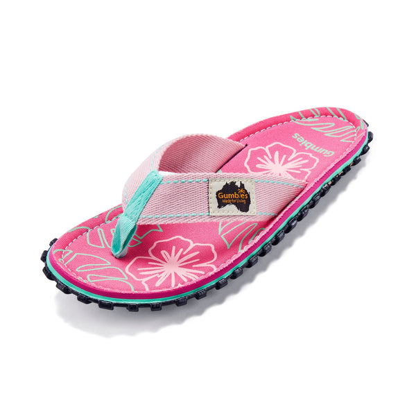 GUMBIES FRANCE Islander pink flip-flops with hibiscus print, turquoise accents, and recycled rubber sole.