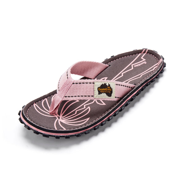 GUMBIES FRANCE Islander palm leaf pink flip-flops with a brown sole, pink straps, and a palm leaf design.