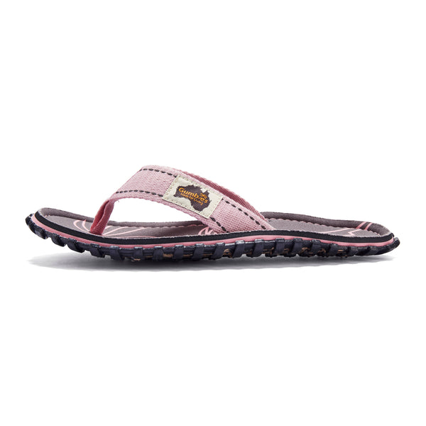 GUMBIES FRANCE Islander pink flip-flops with a palm leaf pattern, made from recycled rubber and jute with a natural cotton strap.