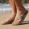 Gumbies FRANCE classic sand canvas flip-flops with a textured rubber sole and a branded tag featuring an Australian map.