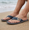 GUMBIES FRANCE Islander Urban Grey flip-flops with a dark grey canvas strap and a patterned sole made from recycled rubber and jute.